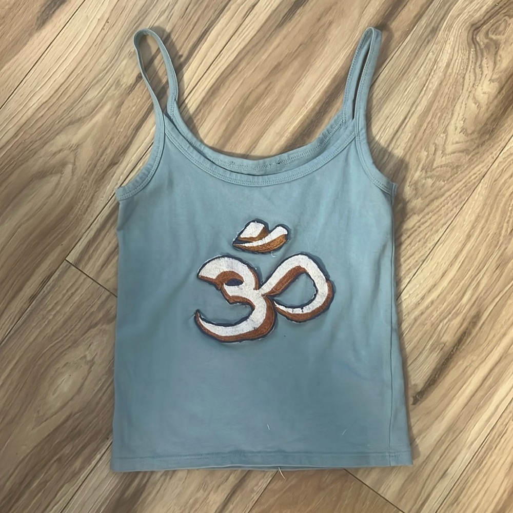 Light blue spaghetti strap tank top yoga om
